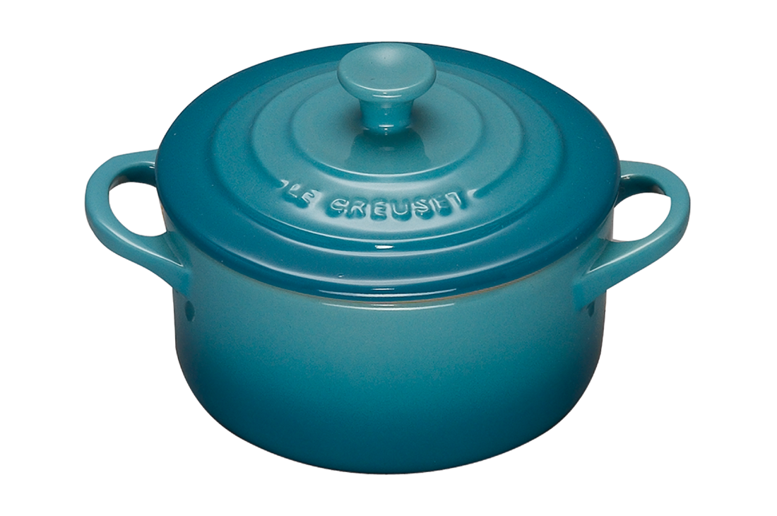 Blue enameled cast iron pot with lid on white background