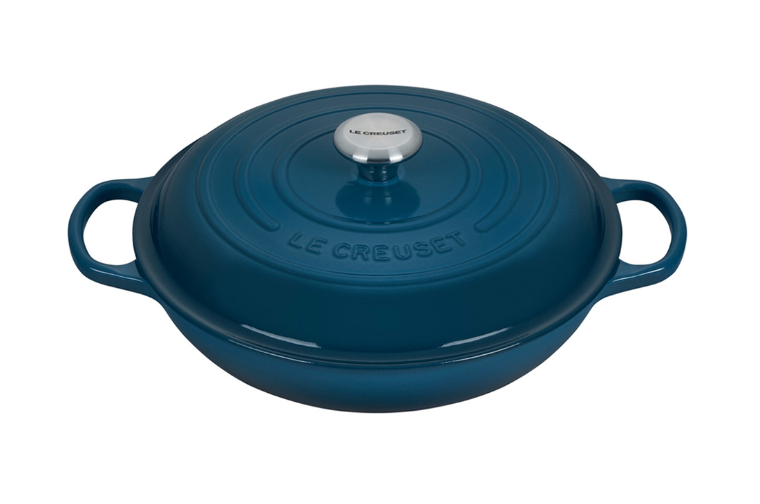 Blue enameled cast iron round Dutch oven with lid and handles