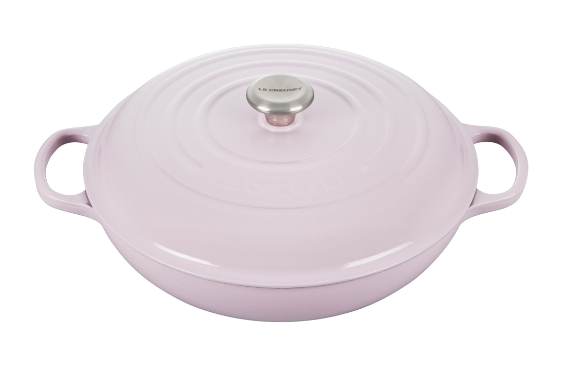 Lavender cast iron Dutch oven with lid and stainless steel knob