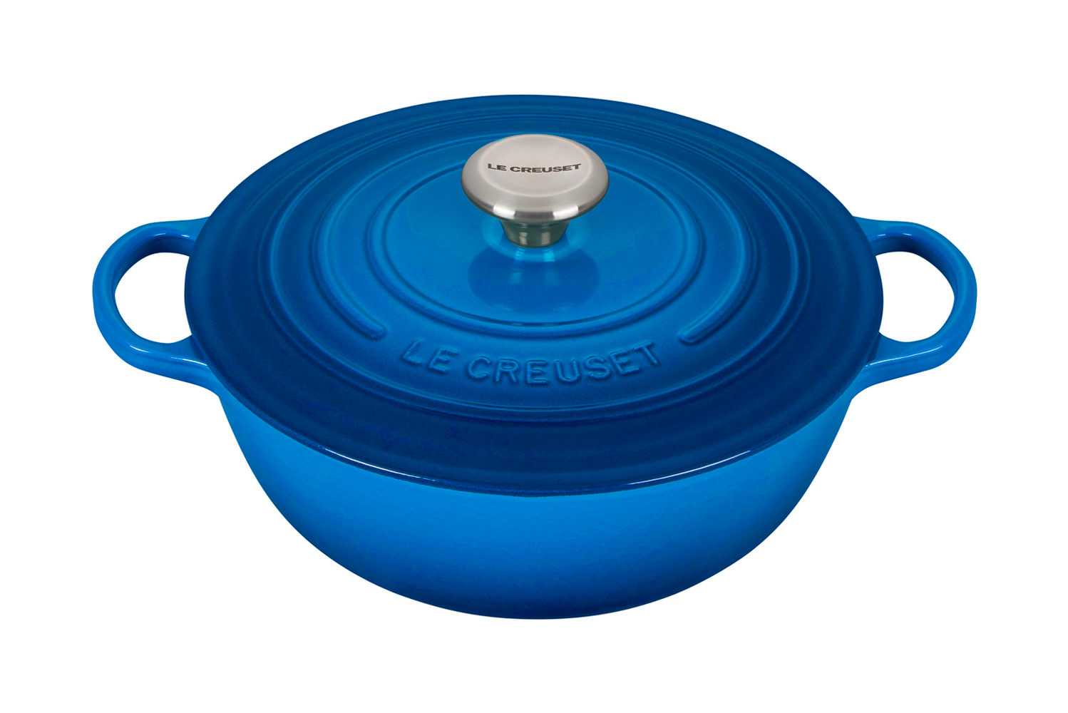 Blue enameled cast iron Dutch oven with lid on white background