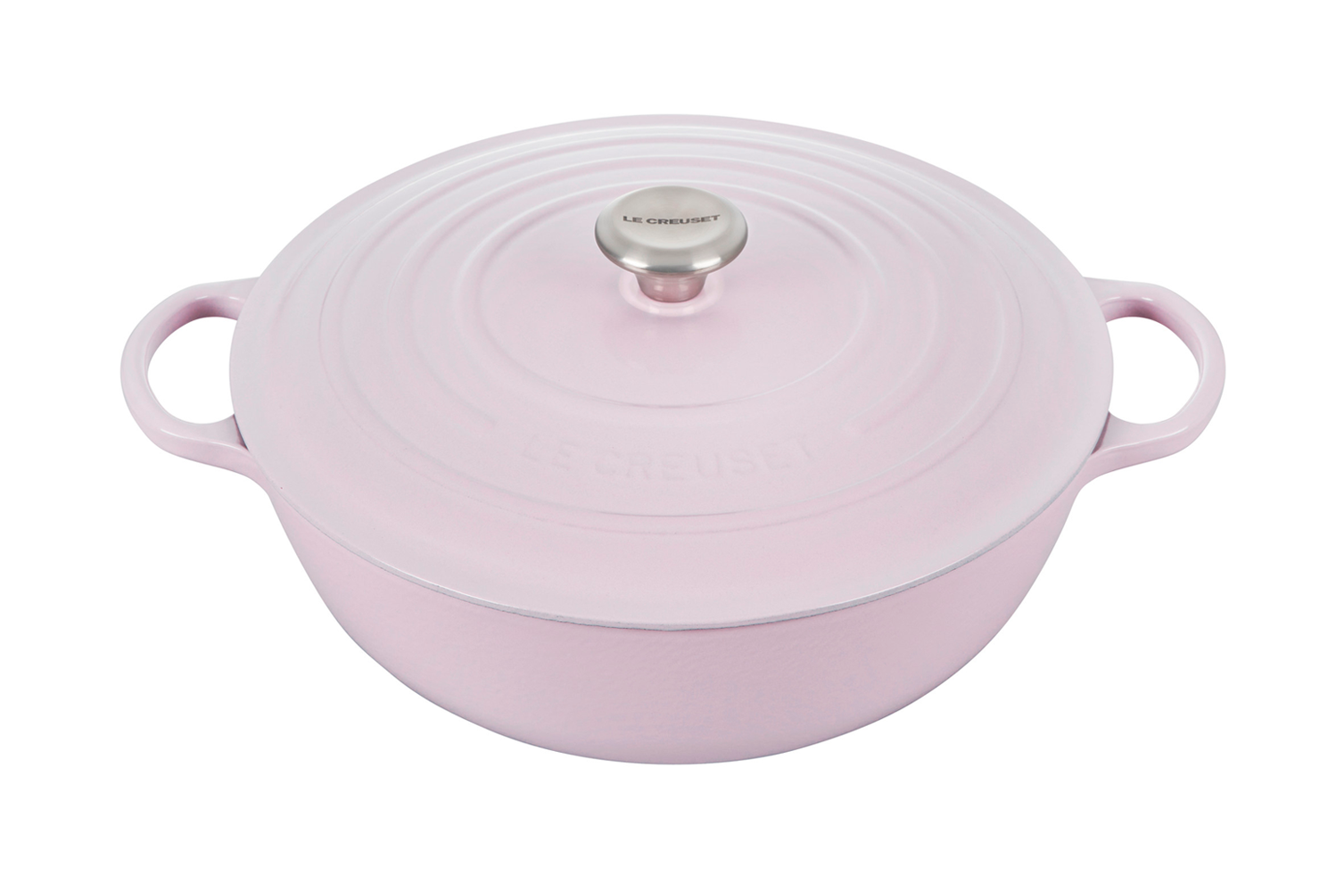 Pink Le Creuset cast iron dutch oven on white background
