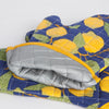 A lose up of the interior lining of Now Designs Lemons Oven Mitt.