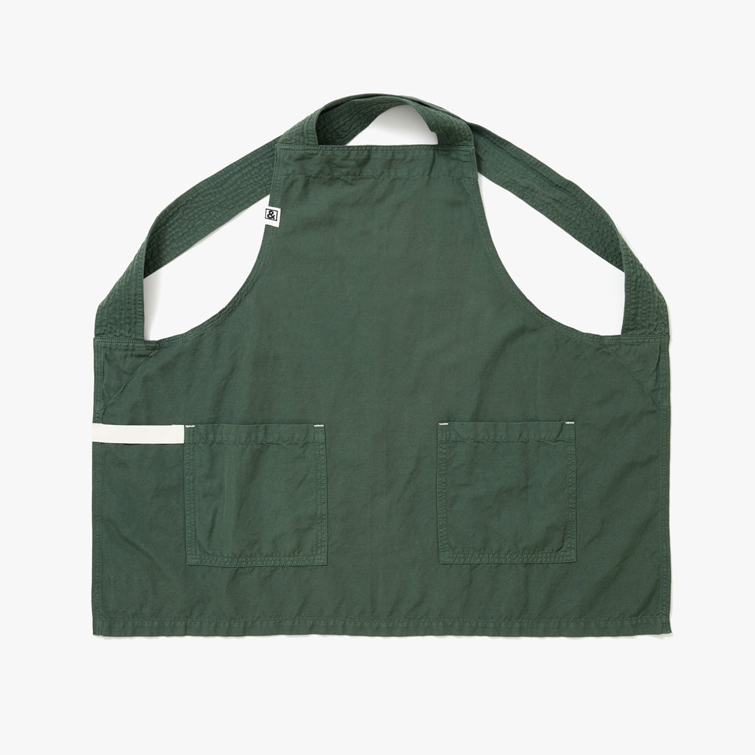 A Hedley & Bennett Broccolini green Smock over a white background.