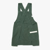 The reverse view of a Hedley & Bennett Broccolini green Smock over a white background.