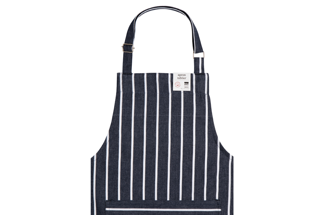 A Now Designs Butcher Stripe Apron over a white background.