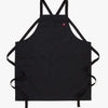 A Hedley & Bennett Caviar Black Crossback Apron over a white background.