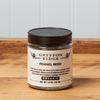 A jar of Gryffon Ridge Fennel Seed sits on a wooden tabletop.