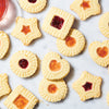 Jam-filled cookies made using King Arthur Baking Company Thumbprint Cookie Cutters.