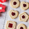 Jam-filled cookies made using King Arthur Baking Company Thumbprint Cookie Cutters.