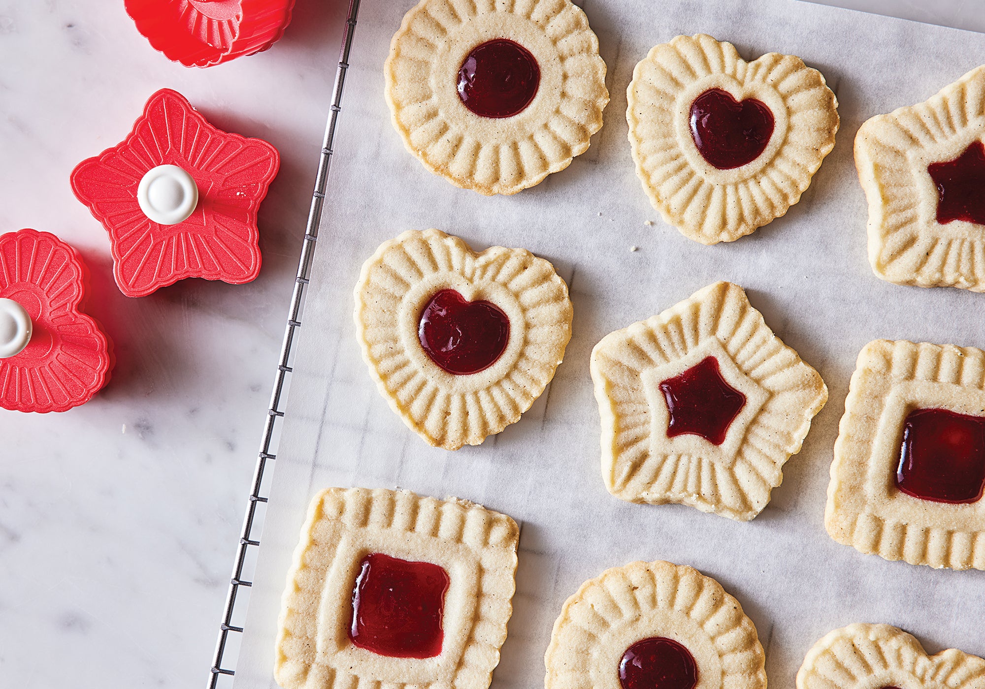 Jam-filled cookies made using King Arthur Baking Company Thumbprint Cookie Cutters.