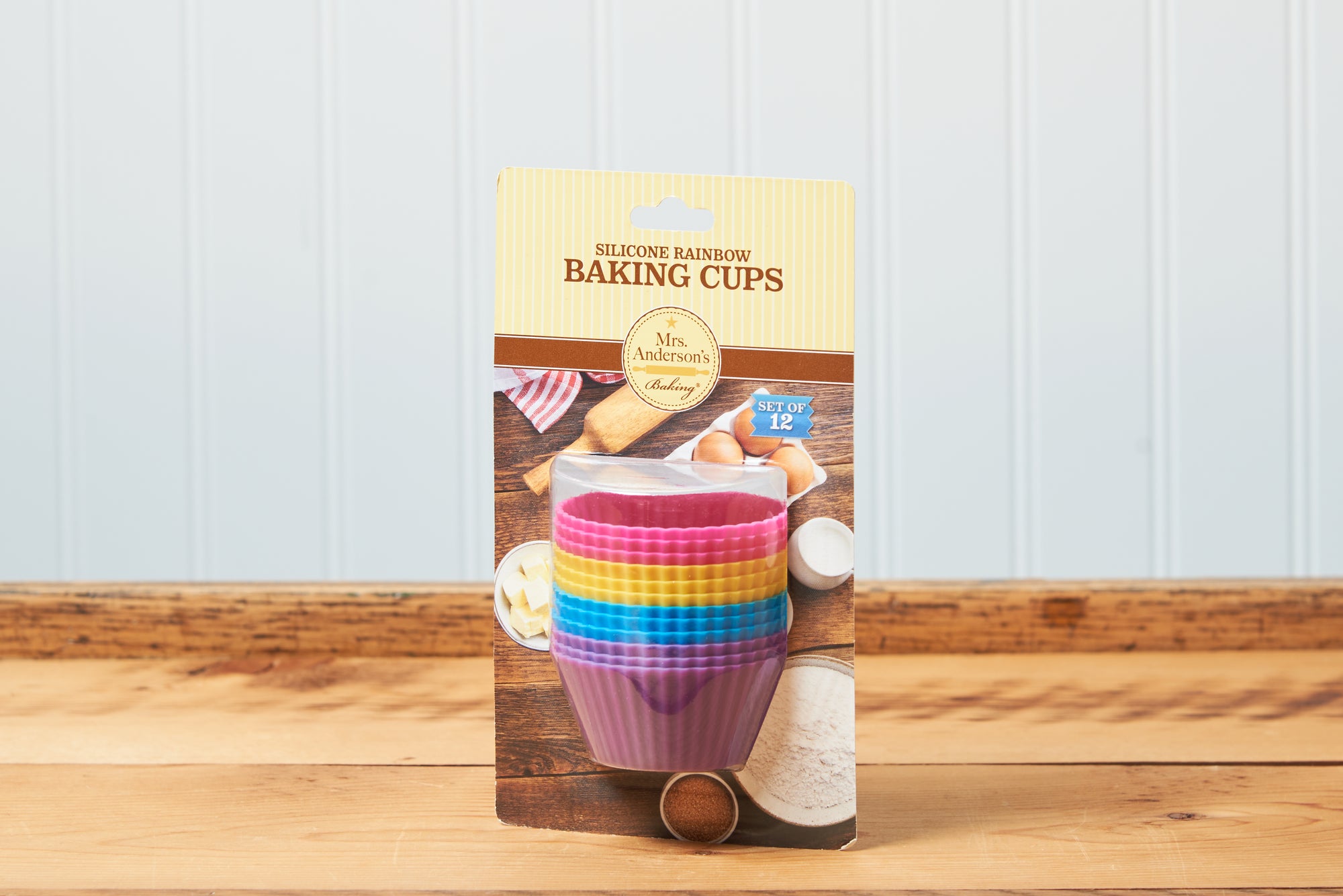 Mrs. Anderson's Baking Silicone Baking Cups, Set of 12 on a wooden tabletop.