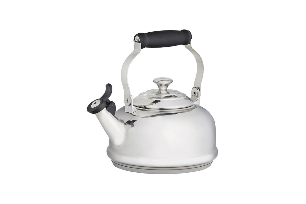 A Le Creuset Classic Kettle in Stainless Steel over a white background.