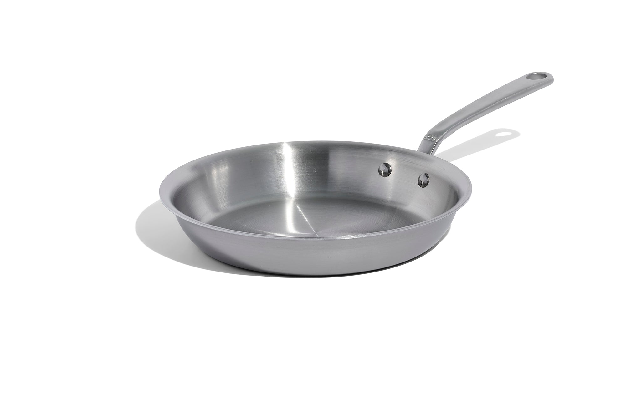 A 10 inch Made In Stainless Clad Frying Pan in front of a white background.