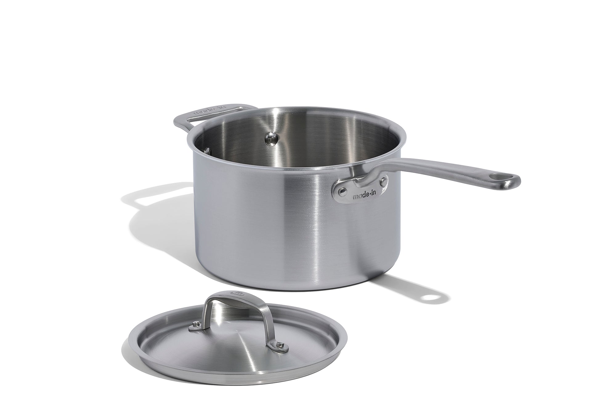 A Made In Stainless Clad Saucepan with Lid in front of a white background.