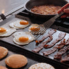 Bason, eggs, and pancakes are cooked on two Made In Seasoned Carbon Steel Griddles.