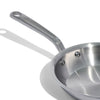 A close up of a Made In Stainless Clad Frying Pan in front of a white background.