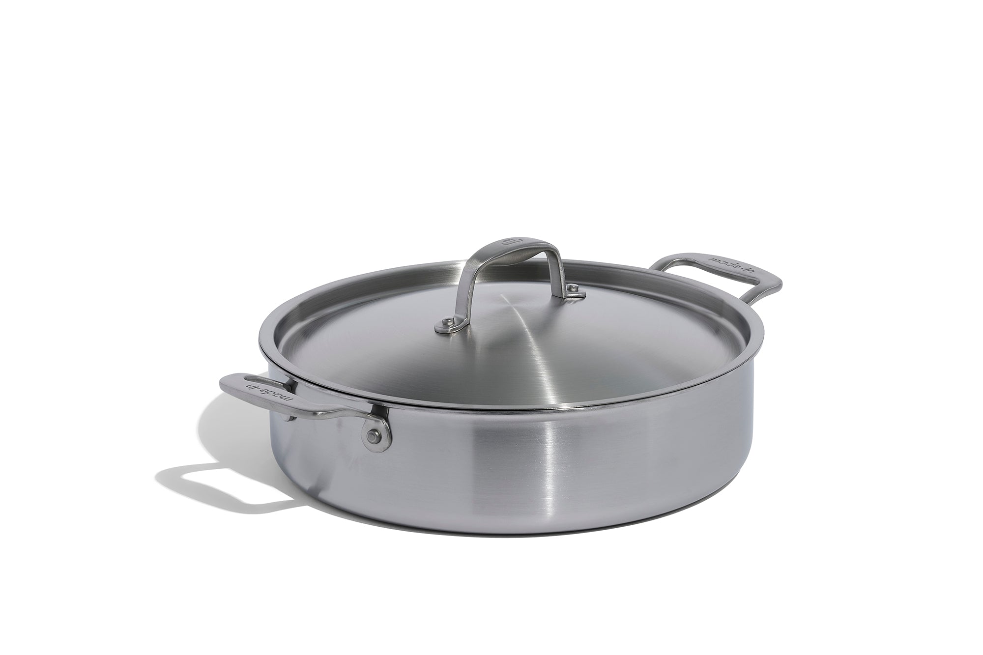 A Made In Stainless Clad Rondeau with Lid in front of a white background.