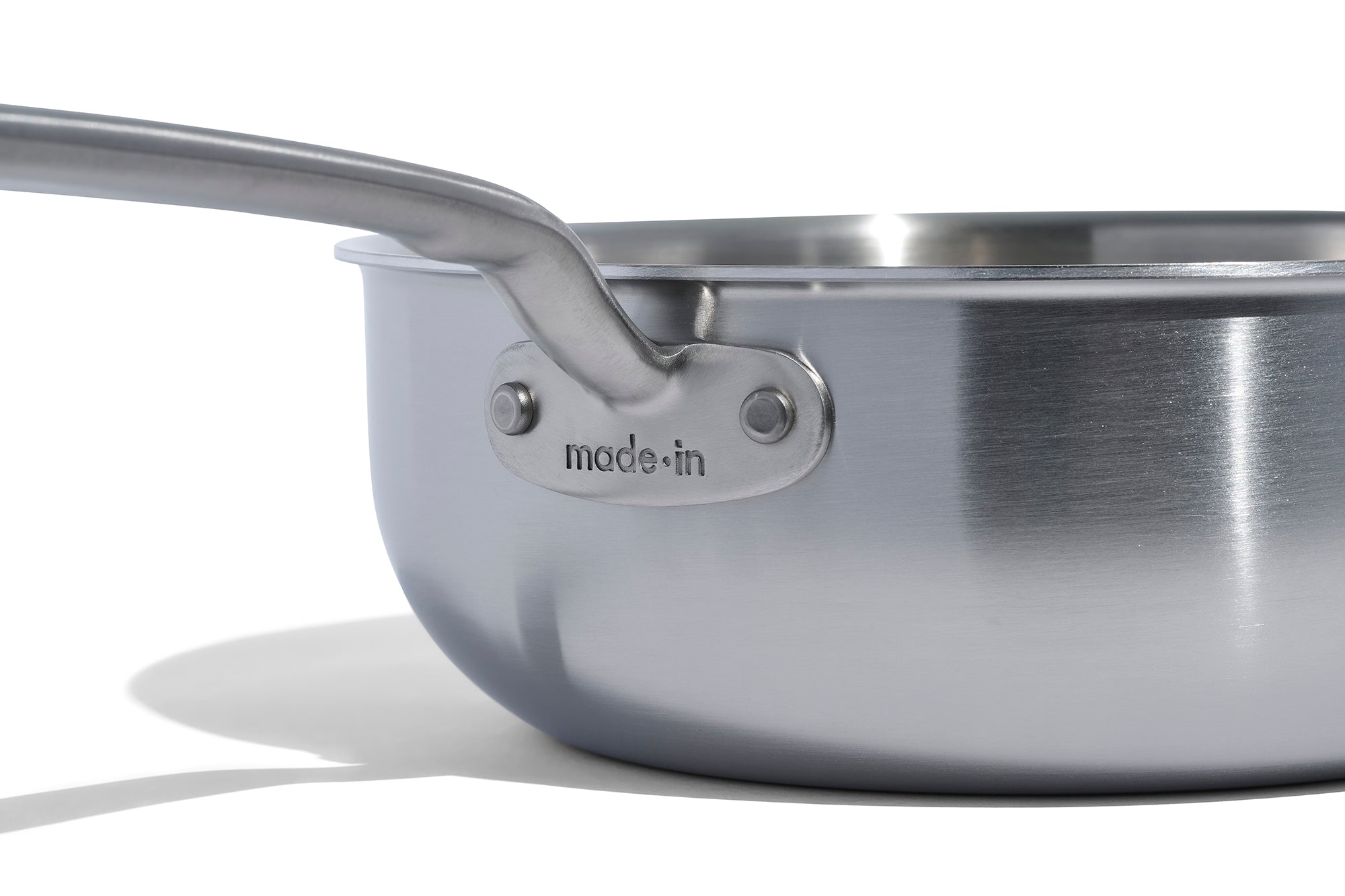 A close up of a Made In Stainless Clad Saucier in front of a white background.