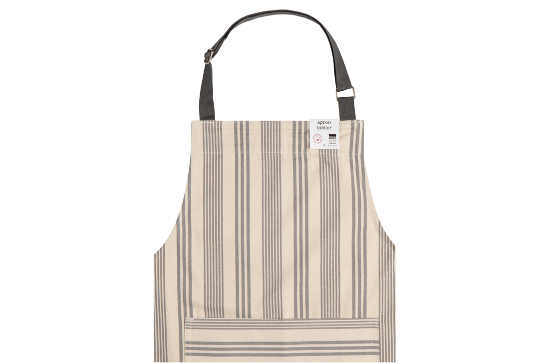 A Now Designs Pencil Stripe Grey Apron over a white background.