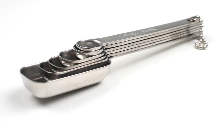 A stacked RSVP Endurance Spice Measuring Spoons, Set of 6 over a white background.