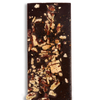 A close up shot of a Ragged Coast Chocolate Bark Ancho Chile and Roasted Pecan bar on a white background.