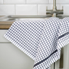A grey Samuel Lamont Poli-Dry Towel hangs over a sink.