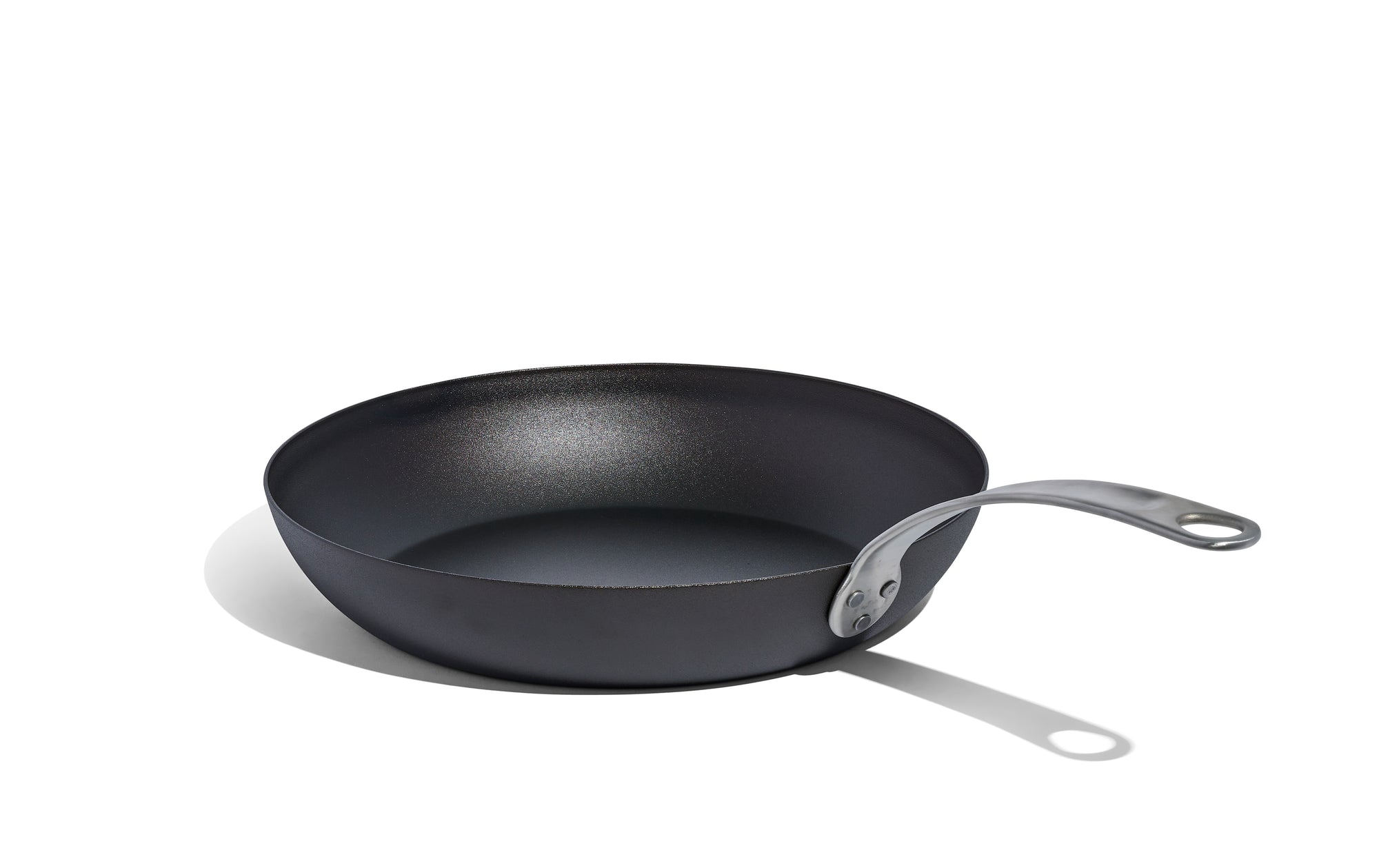 A Made In Seasoned Carbon Steel Fry Pan sits over a white background.
