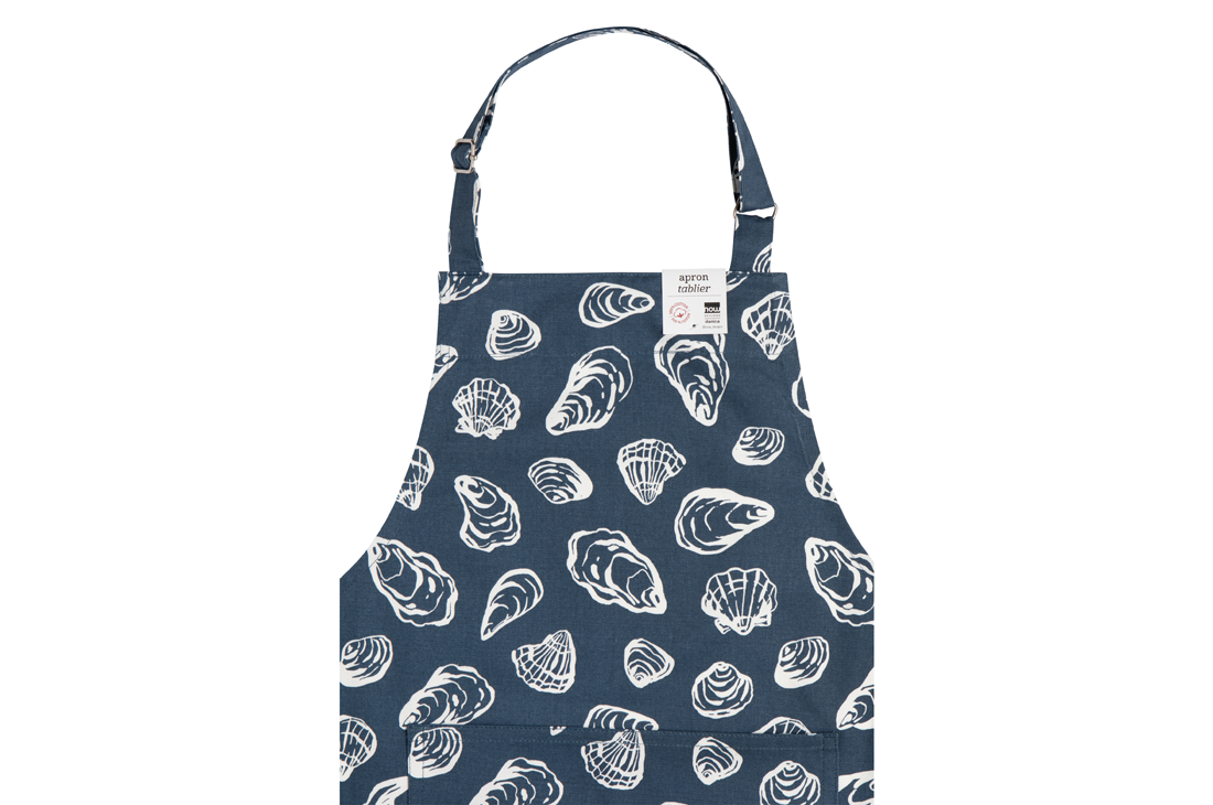 A Now Designs Shellfish Apron over a white background.