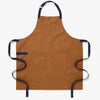 A Hedley & Bennett Denver brown Essential Apron over a white background.