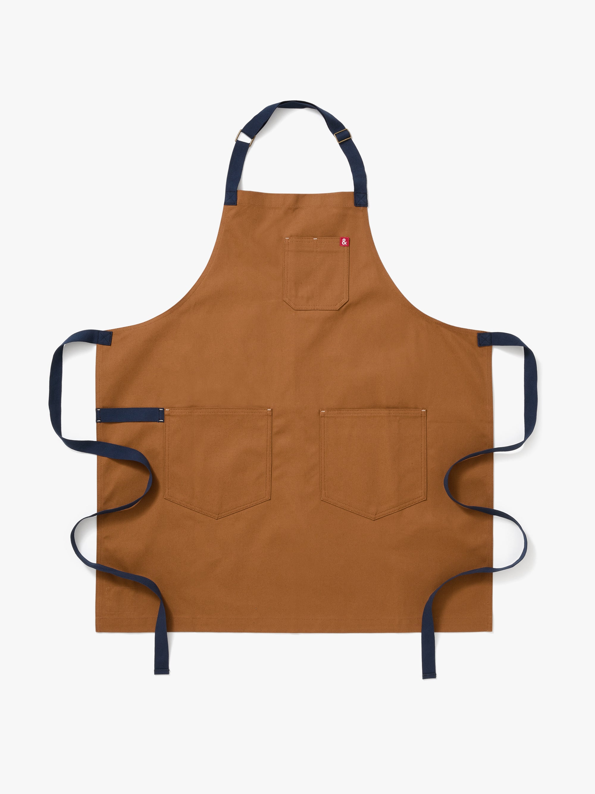 A Hedley & Bennett Denver brown Essential Apron over a white background.