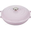 Lavender round cast iron casserole dish with lid on white background